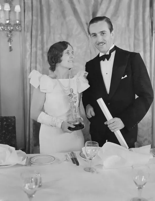 Framed Print : Walt Disney and Wife Holding Oscar