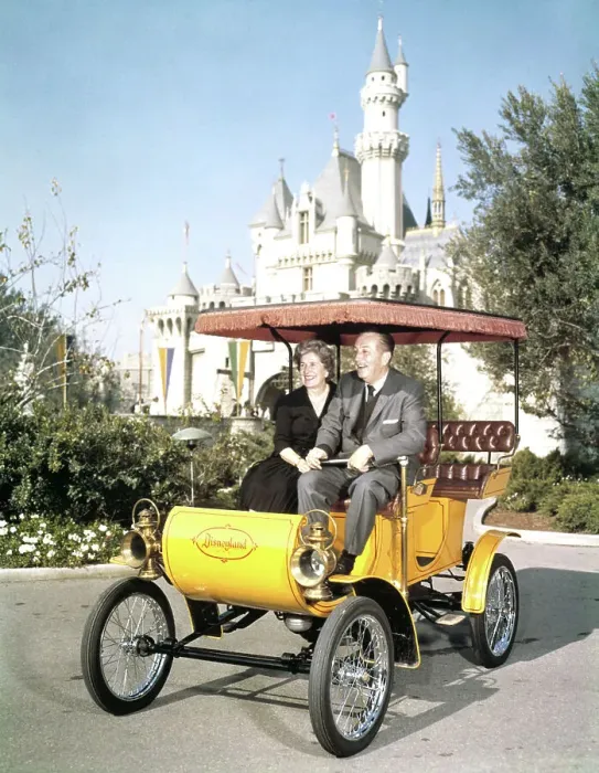 Framed Print : Walt Disney and Wife Riding in Antique Auto at Disneyland Framed Print : Walt Disney and Wife Riding in Antique Auto at Disneyland