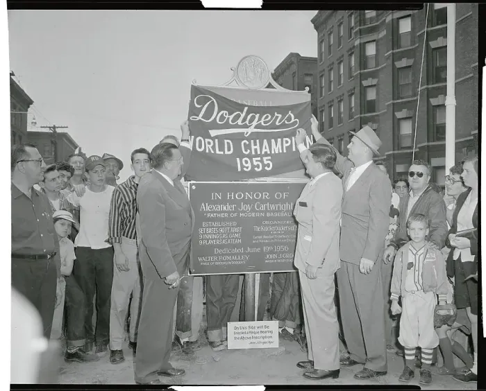 Framed Print : Walter O'Malley and Colleagues Placing a Flag on Monument Framed Print : Walter O'Malley and Colleagues Placing a Flag on Monument
