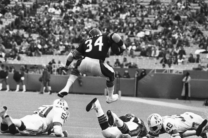 Framed Print : Walter Payton Jumping Over Defenders Framed Print : Walter Payton Jumping Over Defenders