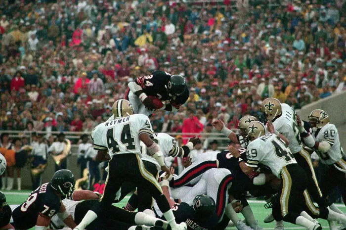 Framed Print : Walter Payton Leaps Over Players to Score Touchdown