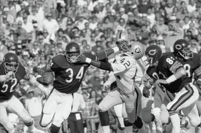 Framed Print : Walter Payton Pushes Away Oakland Raider Tackler Framed Print : Walter Payton Pushes Away Oakland Raider Tackler