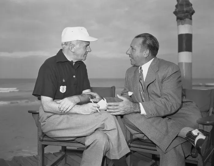 Framed Print : Walter Winchell Interviewing Frank Costello on Beach Framed Print : Walter Winchell Interviewing Frank Costello on Beach