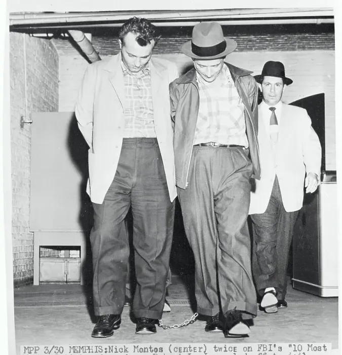 Framed Print : Most Wanted Suspects Being Escorted With Their Heads Down Framed Print : Most Wanted Suspects Being Escorted With Their Heads Down