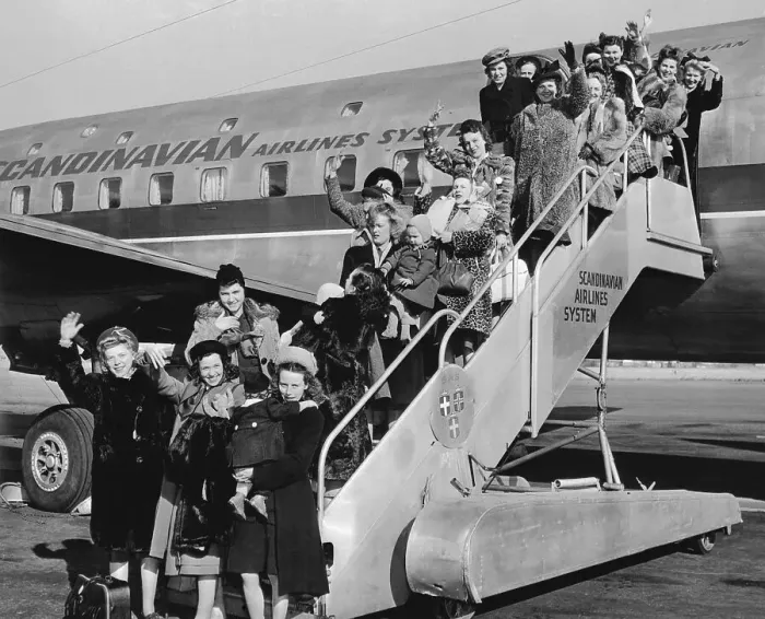 Framed Print : War Brides Wave While Disembarking / Plane Framed Print : War Brides Wave While Disembarking / Plane