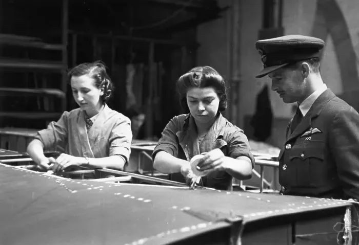 Framed Print : War Work. July 1942: A Royal Air Force pilot visits an aircraft factory Framed Print : War Work. July 1942: A Royal Air Force pilot visits an aircraft factory