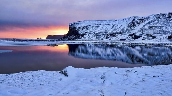 Warm sunset at cold landscape, Vik, Iceland