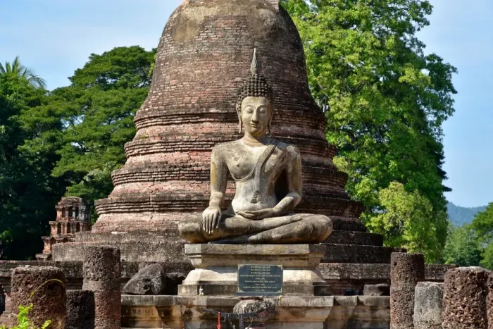 Framed Print : Wat Mahathat statue with stupa Sukhothai Thailand, Asia Framed Print : Wat Mahathat statue with stupa Sukhothai Thailand, Asia