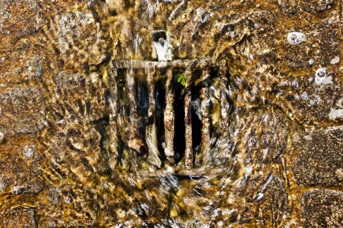 Framed Print : Water running into a sewer Framed Print : Water running into a sewer