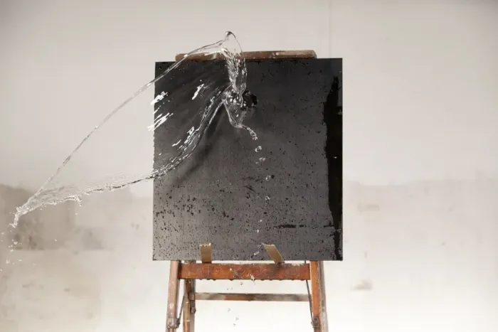 Framed Print : Water being splashed on a blackboard Framed Print : Water being splashed on a blackboard