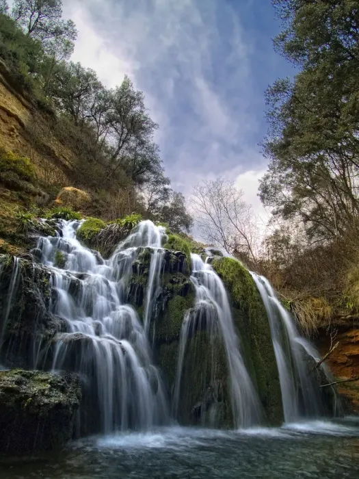 Framed Print : Waterfall called Blue Lake among ravines oaks