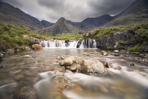 Waterfall in Fairy Pools rocky stream on Isle of Skye Scotland