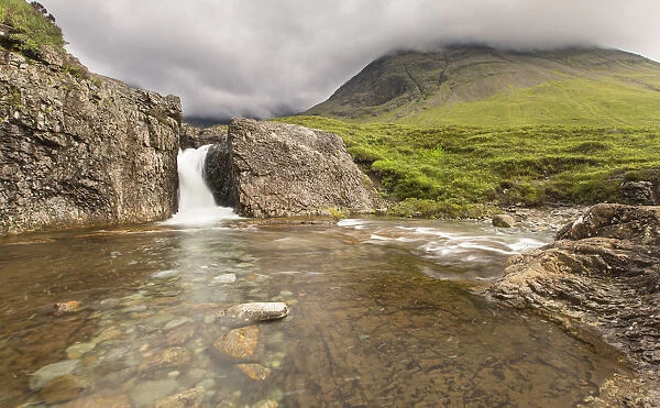 Waterfall in Fairy Pools rocky stream on Isle of Skye - Scotland