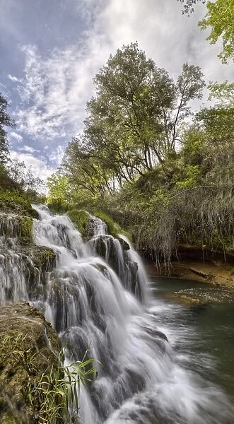 Waterfall in a forest, natural park Mariola