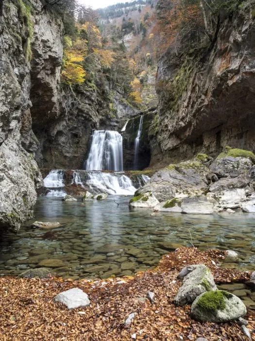 Framed Print : Waterfall in a forest in the Pyrenees in autumn