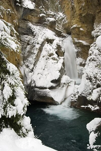 Waterfall in winter, Johnston Canyon, Banff National Park, Alberta, Canada