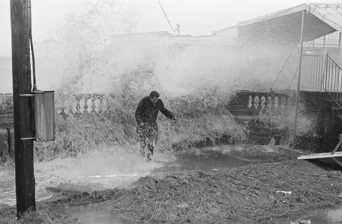 Framed Print : Wave Crashing Over Wall--Man Standing Framed Print : Wave Crashing Over Wall--Man Standing