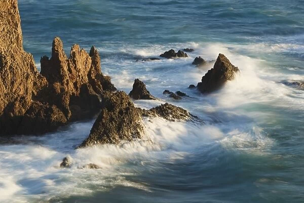 Waves breaking on the arrecife de las sirenas or mermaids reef in cabo de gata-nijar natural park; almeria province spain