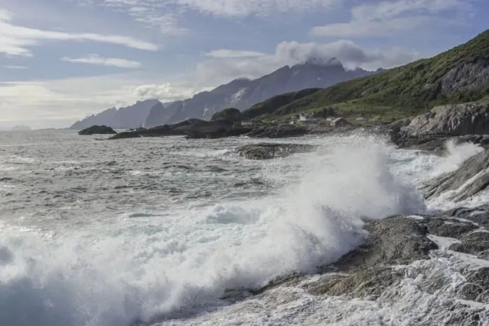 Framed Print : Waves breaking on the rocky coast, cottages and rugged mountains at the back, Flakstad, Lofoten, Nordland, Norway Framed Print : Waves breaking on the rocky coast, cottages and rugged mountains at the back, Flakstad, Lofoten, Nordland, Norway