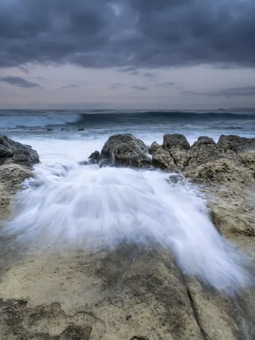 Framed Print : Waves jumping the rocks in the temporary one Framed Print : Waves jumping the rocks in the temporary one