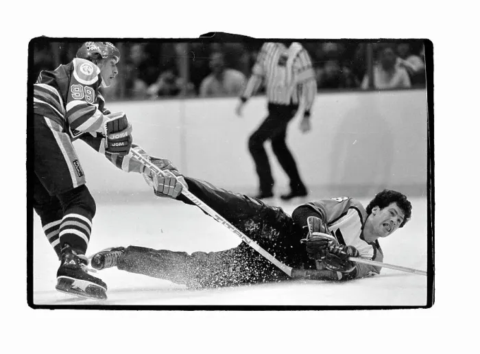 Framed Print : Wayne Gretzky Plays Over Brad Marsh Framed Print : Wayne Gretzky Plays Over Brad Marsh