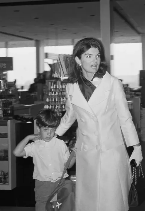Framed Print : Weary John F. Kennedy Jr. with His Mother in Airport Framed Print : Weary John F. Kennedy Jr. with His Mother in Airport