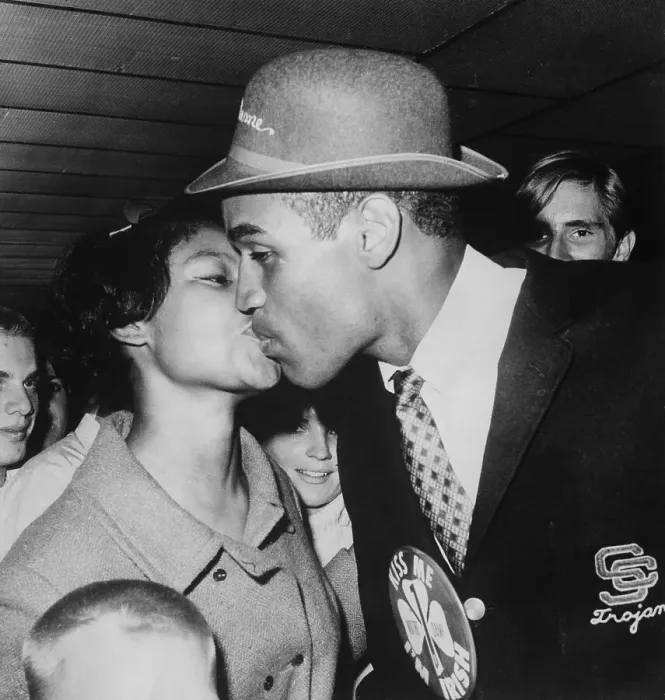 Framed Print : Welcome Kiss for O.J. Simpson from Wife Framed Print : Welcome Kiss for O.J. Simpson from Wife