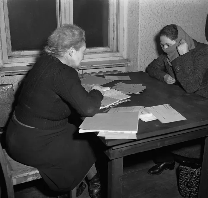 Framed Print : Welfare Worker Interviewing Refugee Framed Print : Welfare Worker Interviewing Refugee