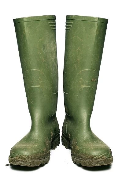 Wellington boots covered in mud