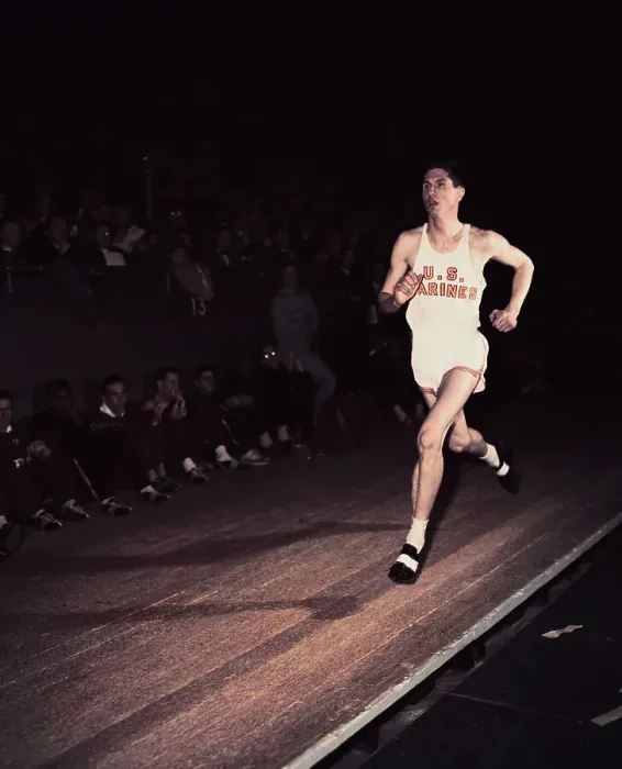 Framed Print : Wes Santee Competing in Race