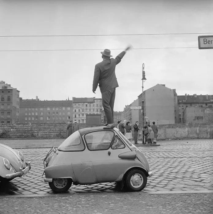 Framed Print : West Berliner Waving to East Berliners Framed Print : West Berliner Waving to East Berliners