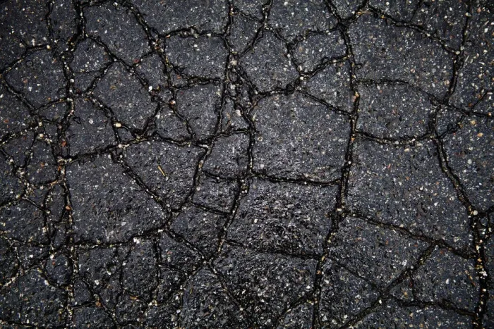 Framed Print : Wet cracked asphalt Framed Print : Wet cracked asphalt