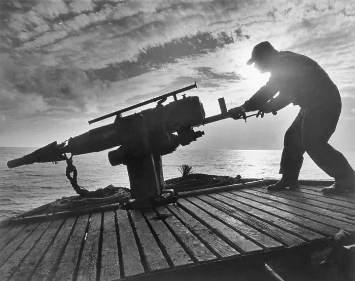 Framed Print : Whaler Aiming Harpoon Gun on Ship Framed Print : Whaler Aiming Harpoon Gun on Ship