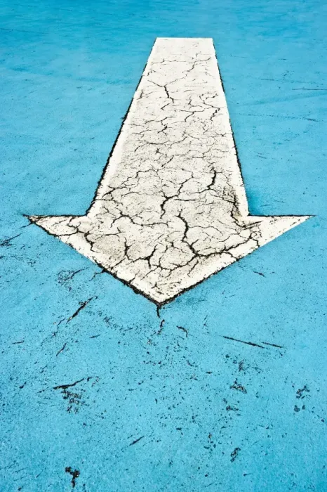 Framed Print : White arrow on blue concrete with cracks Framed Print : White arrow on blue concrete with cracks