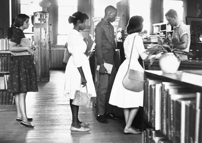 Framed Print : White and Black Students Stand in Line at the Public Library Framed Print : White and Black Students Stand in Line at the Public Library