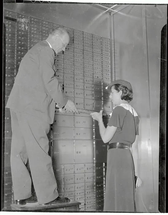 Framed Print : Former White House Guard Working in Safe Deposit Vault