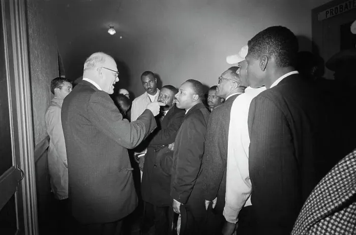 Framed Print : White Man Pointing At Martin L. King