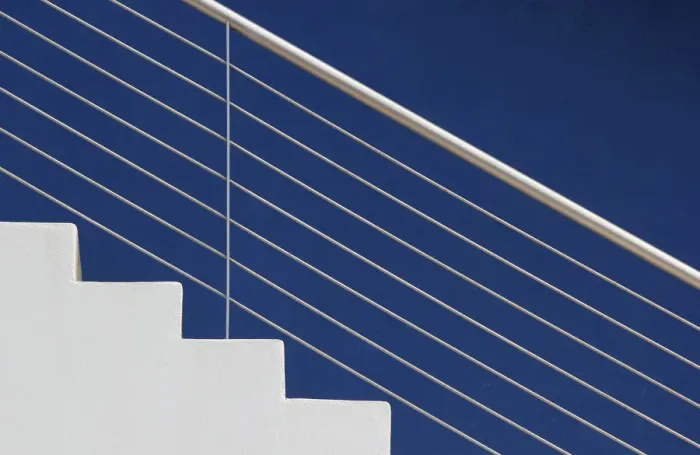 Framed Print : White steps in front of a blue wall Framed Print : White steps in front of a blue wall
