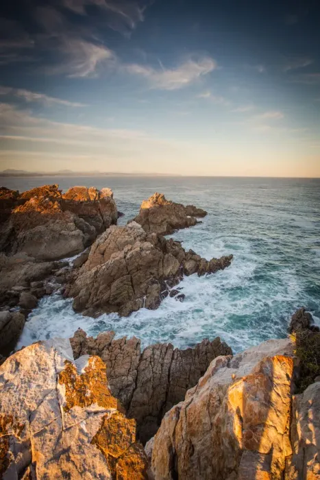 Framed Print : Wide angle landscape image of rock formations and the indian ocean along the Garden Route coast of South Africa