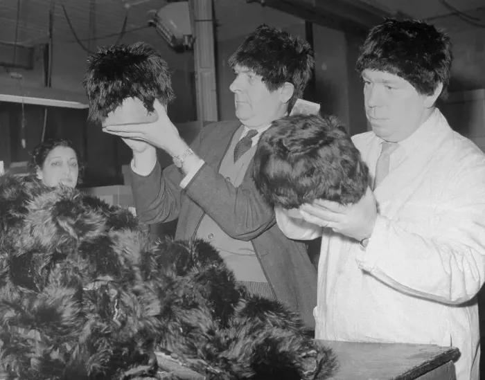 Framed Print : Wig Designers Looking at Wigs