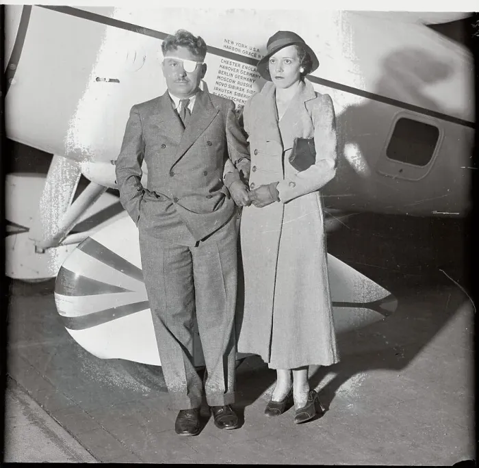 Framed Print : Wiley Post Posing with Wife and Airplane