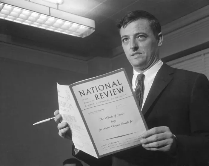 Framed Print : William F. Buckley Holding Book Framed Print : William F. Buckley Holding Book