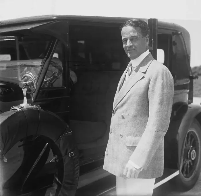 Framed Print : William K. Vanderbilt II Posing Next to a Car Framed Print : William K. Vanderbilt II Posing Next to a Car