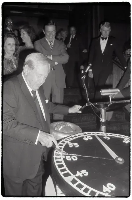 : William Paley Cuts Cake In Form Of Clock : William Paley Cuts Cake In Form Of Clock