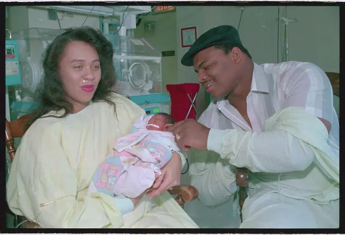 Framed Print : William Perry Admiring His Newborn Daughter Framed Print : William Perry Admiring His Newborn Daughter