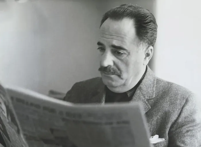 Framed Print : William Saroyan Reading Newspaper Framed Print : William Saroyan Reading Newspaper