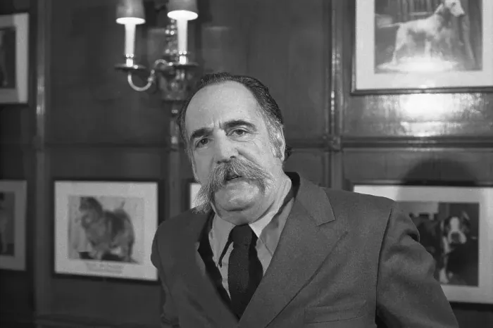 Framed Print : William Saroyan Standing by Wall Framed Print : William Saroyan Standing by Wall