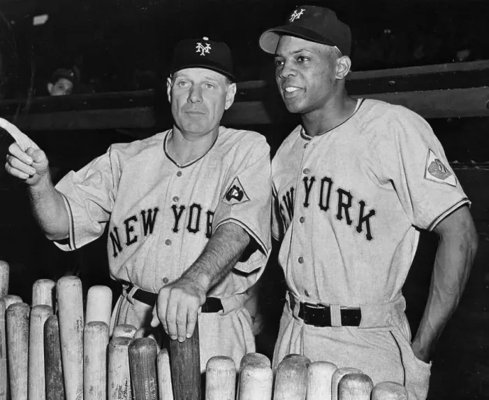 Framed Print : Willie Mays with Leo Durocher Standing over Baseball Bats Framed Print : Willie Mays with Leo Durocher Standing over Baseball Bats