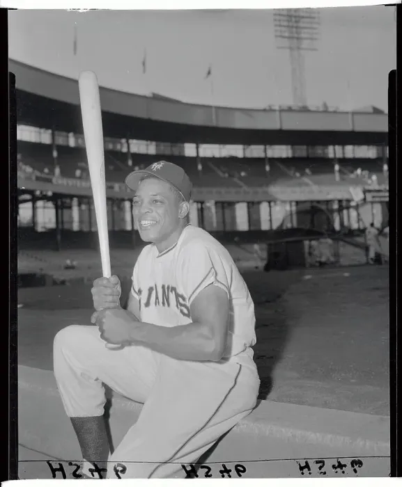Framed Print : Willie Mays Sitting on Ledge and Holding Bat Framed Print : Willie Mays Sitting on Ledge and Holding Bat