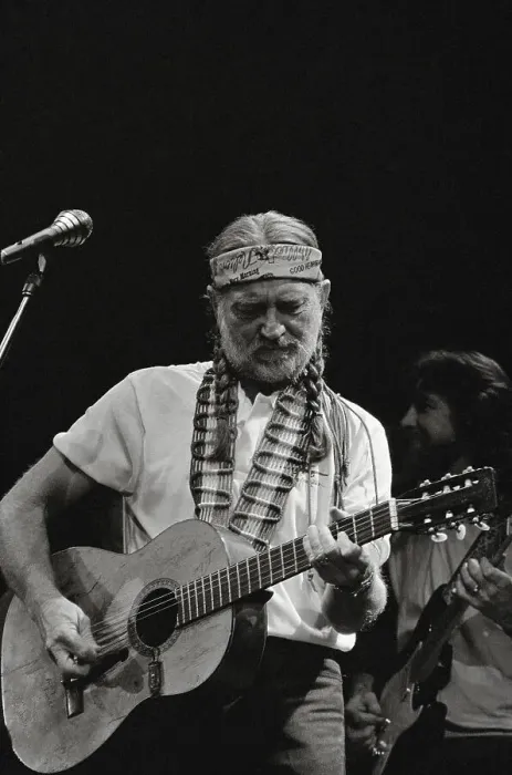 Framed Print : Willie Nelson Playing Guitar